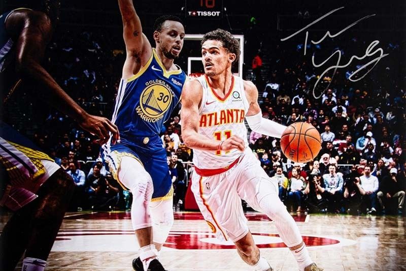 Own authenticated sports memorabilia like this signed Trae Young poster on http://hofa.ph/
